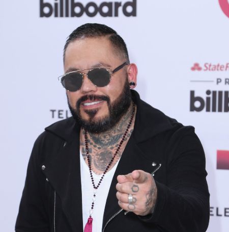 A.B. Quintanilla learned to play the guitar and bass during his stay in Lake Jackson, Texas. 